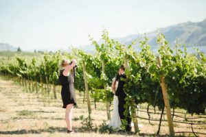 kelowna photographer photographing a bride and groom